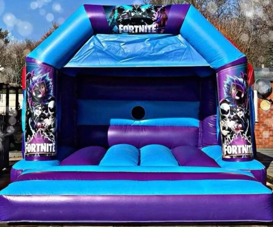 Fortnite Battle Bounce bouncy castle set up on grass
