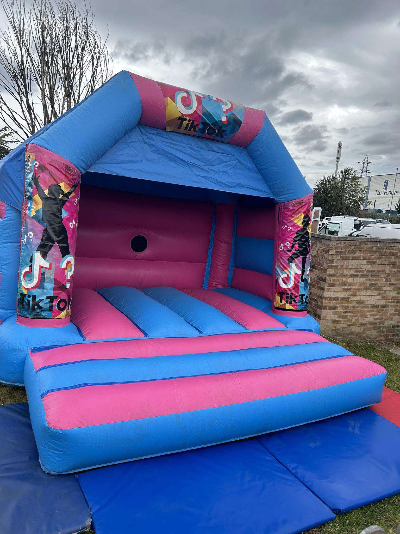 Magic Mix & Match themed bouncy castle setup for a party